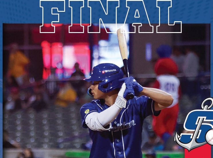 Baseball batter in a blue uniform swings a bat during a game, with a large 'FINAL' banner across the top.